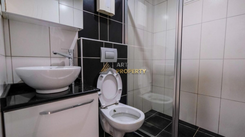 Отличная меблированная квартира планировки 1+1, 48м2 в центральной части города Аланья - Ракурс 11