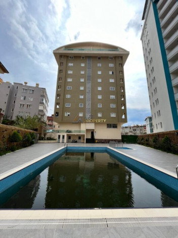 Меблированная квартира планировки 1+1, 50м2 в центре города Аланья - Ракурс 9