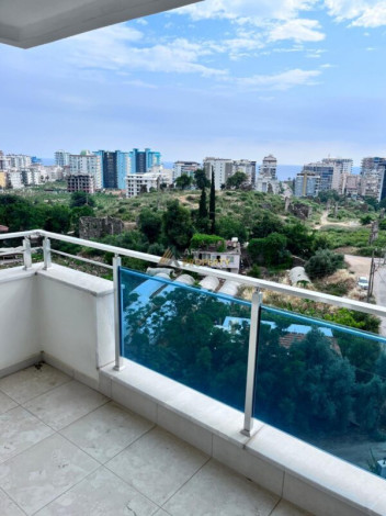 Меблированная квартира планировки 1+1, 70м2 с видом на историческое наследие и Средиземное море, Махмутлар - Ракурс 7