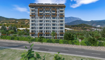 Выгодные инвестиции! Новый проект на этапе котлована в перспективном районе Демирташ, 65-130 м2 - Ракурс 1