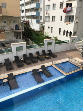 Меблированная квартира планировки 1+1, 60м2 в шаговой доступности до пляжа Клеопатра - Ракурс 7