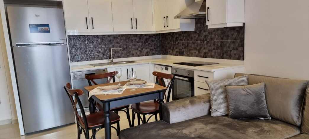 Меблированная квартира планировки 1+1, 60м2 в районе Каргыджак - Ракурс 7