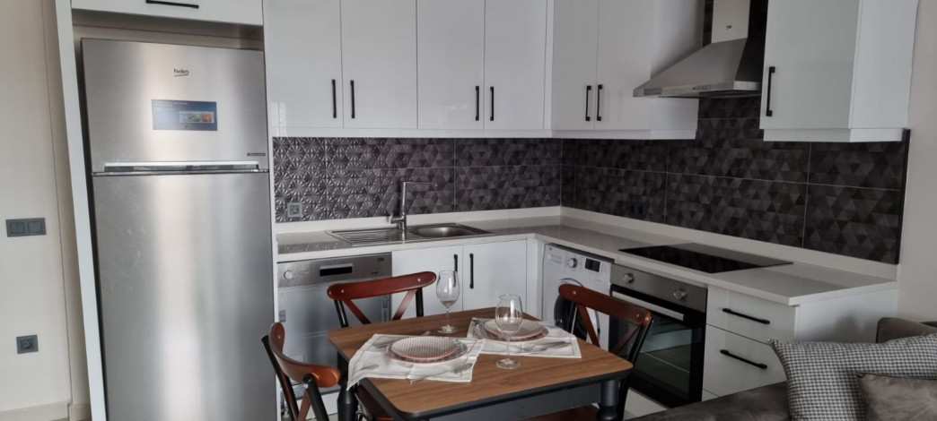 Меблированная квартира планировки 1+1, 60м2 в районе Каргыджак - Ракурс 17