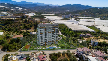 Выгодные инвестиции! Новый проект на этапе котлована в перспективном районе Демирташ, 65-130 м2 - Ракурс 9