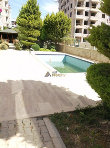 Квартира планировки 1+1 с большой	 площадью 75м2 в районе Авсаллар - Ракурс 8