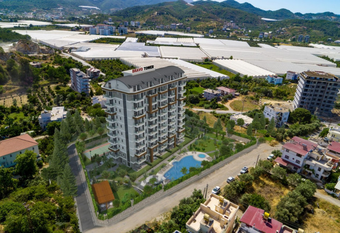 Выгодные инвестиции! Новый проект на этапе котлована в перспективном районе Демирташ, 65-130 м2 - Ракурс 9