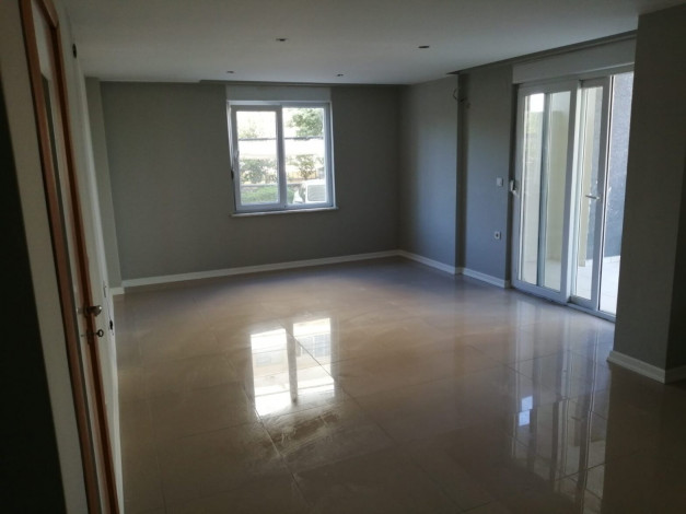 Квартира планировки 1+1 с большой	 площадью 75м2 в районе Авсаллар - Ракурс 9