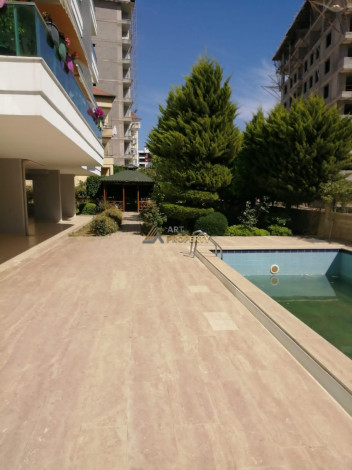 Квартира планировки 1+1 с большой	 площадью 75м2 в районе Авсаллар - Ракурс 13