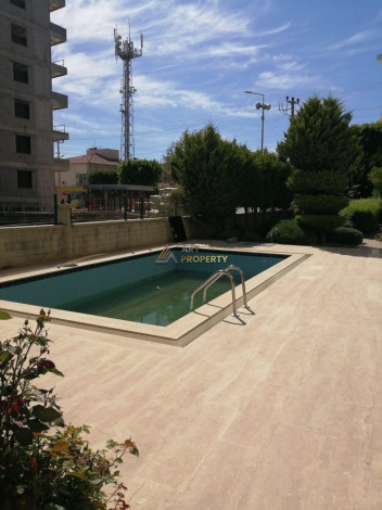 Квартира планировки 1+1 с большой	 площадью 75м2 в районе Авсаллар - Ракурс 19