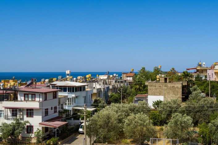 Выгодные инвестиции! Новый проект на этапе котлована в перспективном районе Демирташ, 65-130 м2 - Ракурс 30