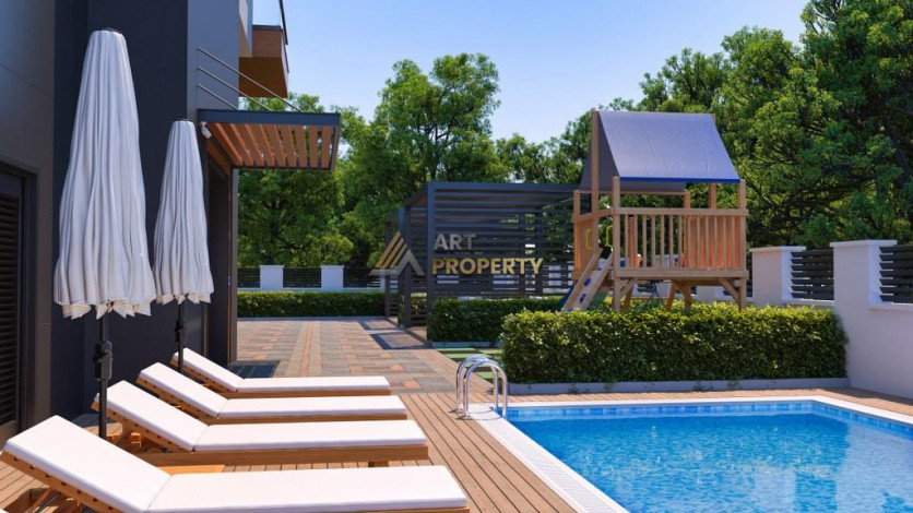 Инвестиционный проект с апартаментами 1+1 и 2+1 в самом сердце района Махмутлар - Ракурс 4