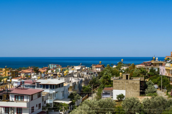 Выгодные инвестиции! Новый проект на этапе котлована в перспективном районе Демирташ, 65-130 м2 - Ракурс 32