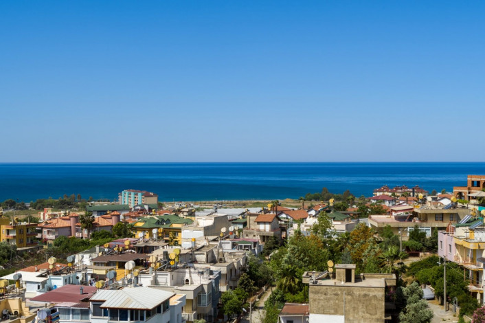 Выгодные инвестиции! Новый проект на этапе котлована в перспективном районе Демирташ, 65-130 м2 - Ракурс 35