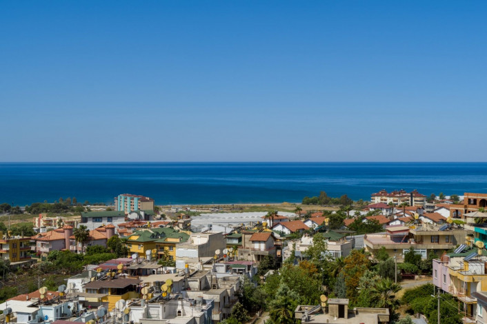 Выгодные инвестиции! Новый проект на этапе котлована в перспективном районе Демирташ, 65-130 м2 - Ракурс 36