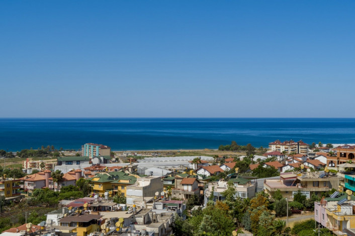 Выгодные инвестиции! Новый проект на этапе котлована в перспективном районе Демирташ, 65-130 м2 - Ракурс 37