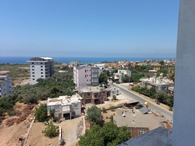 Апартаменты 2+1 на этапе строительства с видом на море и горы в районе Демирташ, 107 м2 - Ракурс 8
