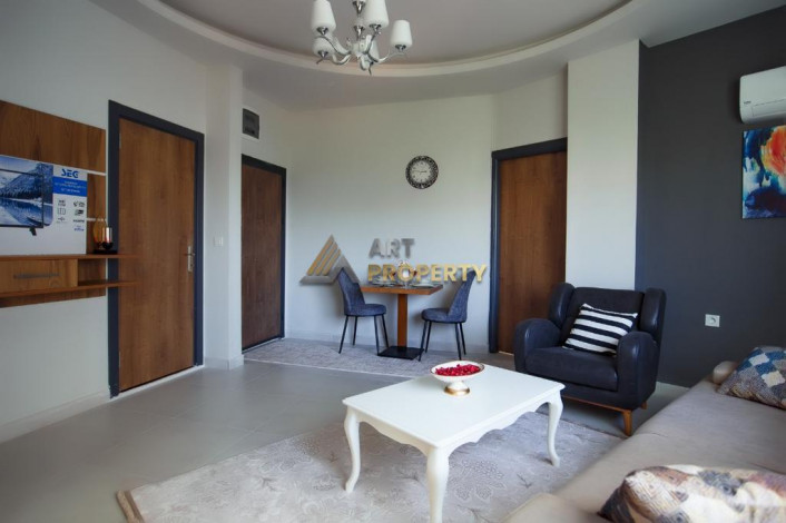 Меблированная квартира 1+1 по привлекательной цене рядом с морем в районе Махмутлар, 50 м2 - Ракурс 9