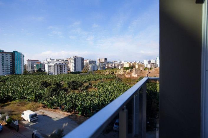 Меблированная квартира 1+1 по привлекательной цене рядом с морем в районе Махмутлар, 50 м2 - Ракурс 10