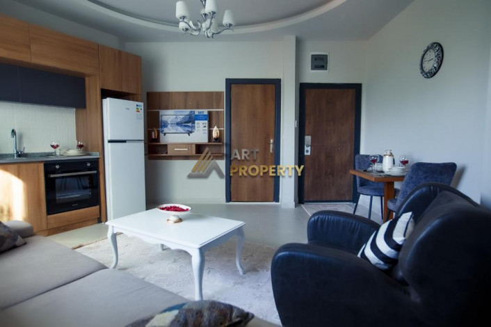 Меблированная квартира 1+1 по привлекательной цене рядом с морем в районе Махмутлар, 50 м2 - Ракурс 12