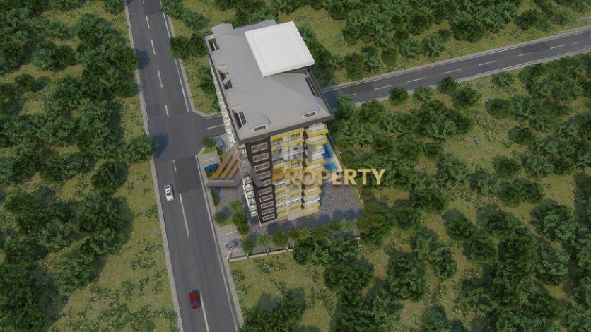 Новый инвестиционный проект на ул. Барбарос в Махмутларе! Беспроцентная рассрочка платежа до окончания строительства! - Ракурс 19