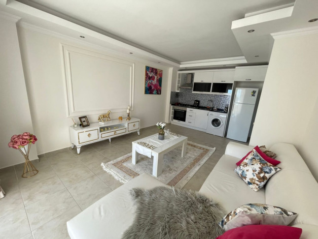 Меблированная квартира планировки 1+1, 65м2 в популярном районе Махмутлар - Ракурс 9