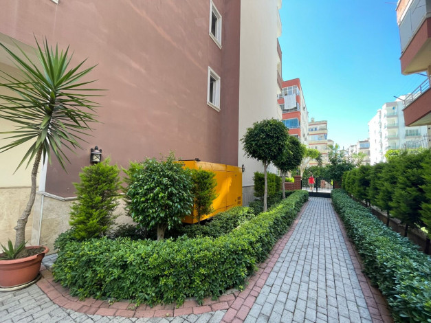 Меблированная квартира планировки 1+1, 65м2 в популярном районе Махмутлар - Ракурс 10