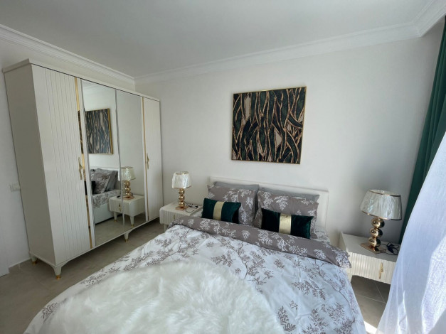 Меблированная квартира планировки 1+1, 65м2 в популярном районе Махмутлар - Ракурс 14