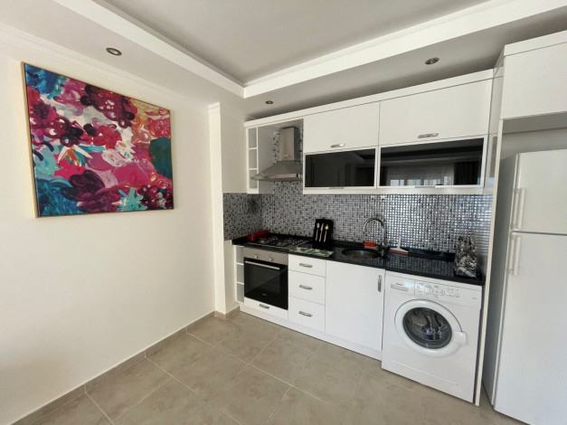 Меблированная квартира планировки 1+1, 65м2 в популярном районе Махмутлар - Ракурс 16