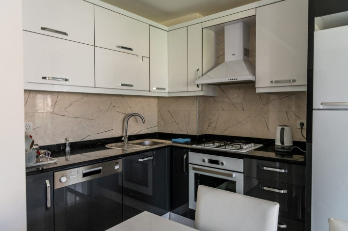 Красивая двухкомнатная квартира с шикарным видом на Торосские горы в Махмутларе, 50 м2 - Ракурс 4