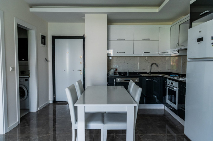 Красивая двухкомнатная квартира с шикарным видом на Торосские горы в Махмутларе, 50 м2 - Ракурс 12