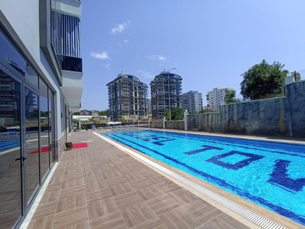 Пентхаус планировки 4+1, 160м2 с видом на море в новом жилом комплексе в районе Махмутлар - Ракурс 31