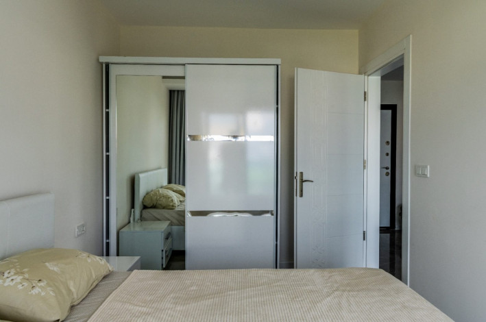 Красивая двухкомнатная квартира с шикарным видом на Торосские горы в Махмутларе, 50 м2 - Ракурс 18