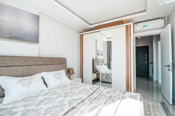 Квартира планировки 1+1, 60м2 с потрясающим видом на Средиземное море, район Махмутлар - Ракурс 2