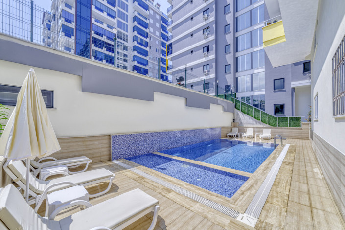 Меблированная квартира планировки 2+1, 90м2 в новом жилом комплексе, район Махмутлар - Ракурс 17