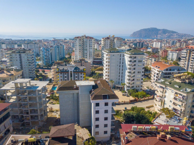 Новый современный инвестиционный проект с квартирами 1+1, 2+1 в районе Джикджилли - Ракурс 8