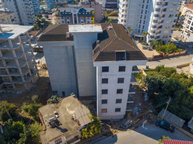 Новый современный инвестиционный проект с квартирами 1+1, 2+1 в районе Джикджилли - Ракурс 9