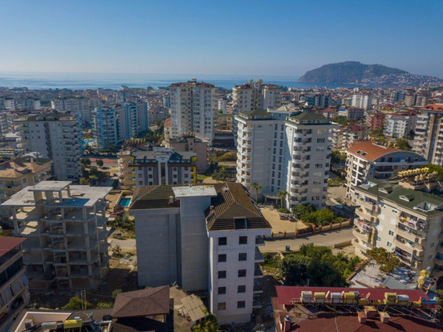 Новый современный инвестиционный проект с квартирами 1+1, 2+1 в районе Джикджилли - Ракурс 11