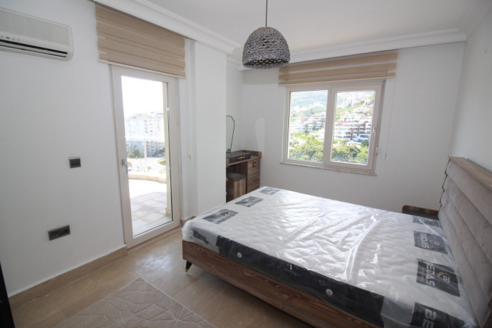 Меблированная квартира планировки 2+1, 110м2 с видом на горы и Средиземное море в районе Джикджилли - Ракурс 2