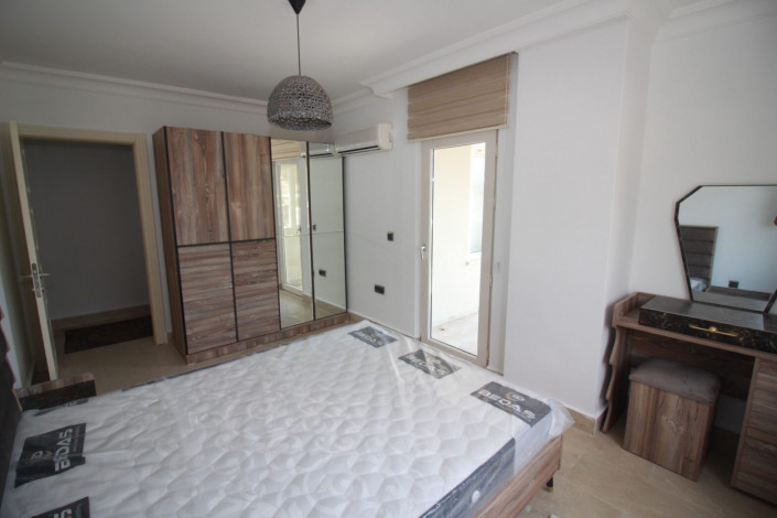 Меблированная квартира планировки 2+1, 110м2 с видом на горы и Средиземное море в районе Джикджилли - Ракурс 3