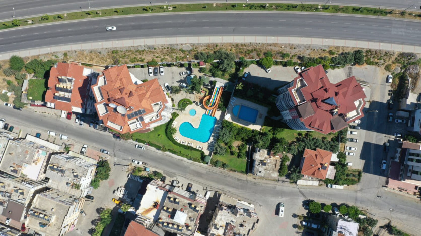 Меблированная квартира планировки 2+1, 110м2 с видом на горы и Средиземное море в районе Джикджилли - Ракурс 10