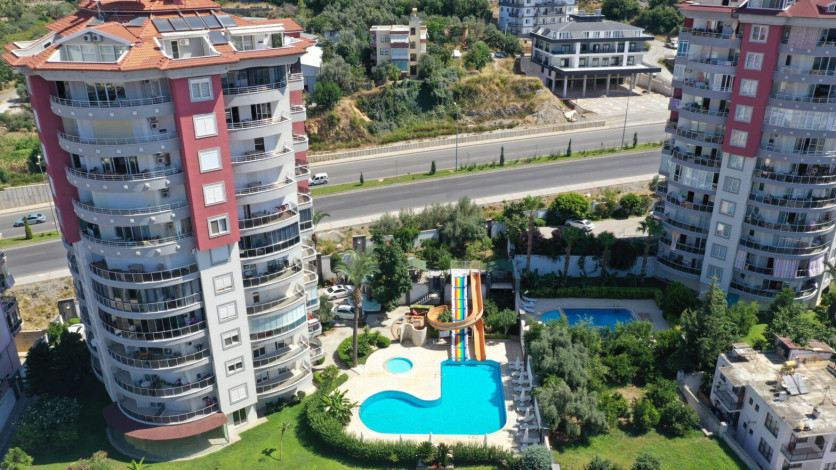 Меблированная квартира планировки 2+1, 110м2 с видом на горы и Средиземное море в районе Джикджилли - Ракурс 12