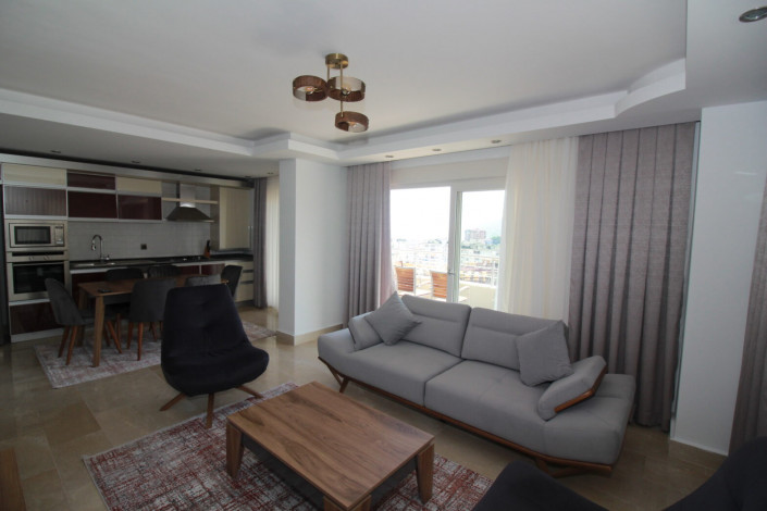 Меблированная квартира планировки 2+1, 110м2 с видом на горы и Средиземное море в районе Джикджилли - Ракурс 22