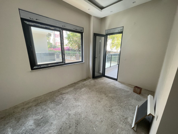 Две новые квартиры планировки 1+1, 55м2 в престижном районе в центре города Аланья - Ракурс 2