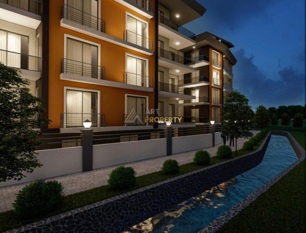 Две новые квартиры планировки 1+1, 55м2 в престижном районе в центре города Аланья - Ракурс 10