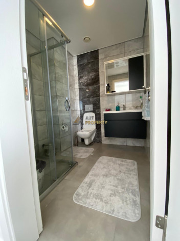 Меблированная квартира планировки 1+1, 58м2 в районе Махмутлар - Ракурс 16