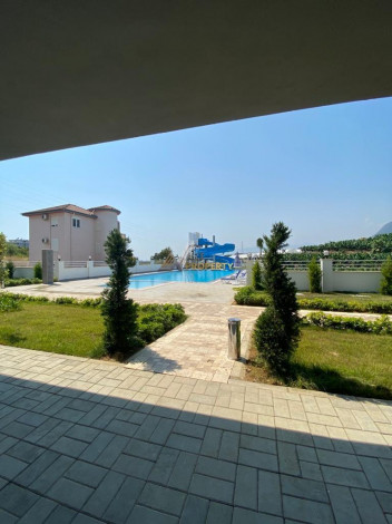 Меблированная квартира планировки 1+1, 58м2 в районе Махмутлар - Ракурс 28