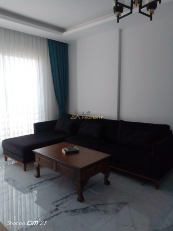 Меблированная квартира планировки 1+1, 58м2 в районе Махмутлар - Ракурс 38