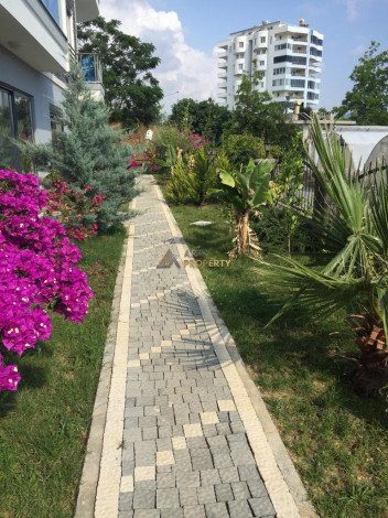 Меблированная квартира планировки 1+1, 58м2 в районе Махмутлар - Ракурс 50