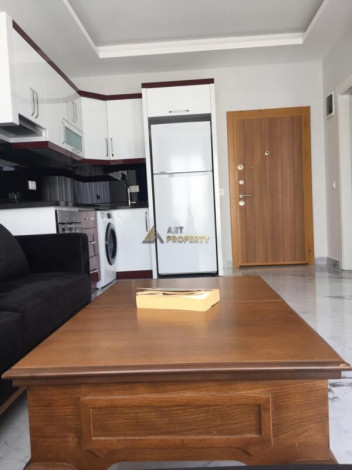 Меблированная квартира планировки 1+1, 58м2 в районе Махмутлар - Ракурс 54