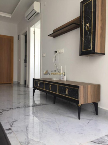 Меблированная квартира планировки 1+1, 58м2 в районе Махмутлар - Ракурс 57